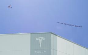 Megasite makes appeal to Tesla with flyover banner